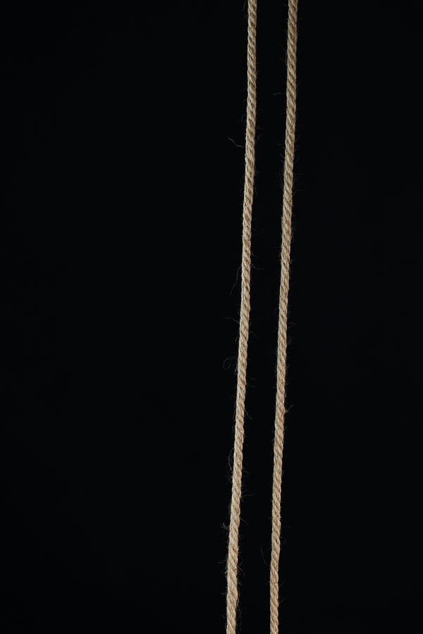 Two thin ropes on a black background. 
Couture & Canvas brings photography, art, and fashion into dialogue, transforming perception through creativity and style.
This signature concept bridges image and imagination, offering a unique vision that inspires individuals, brands, and magazines.