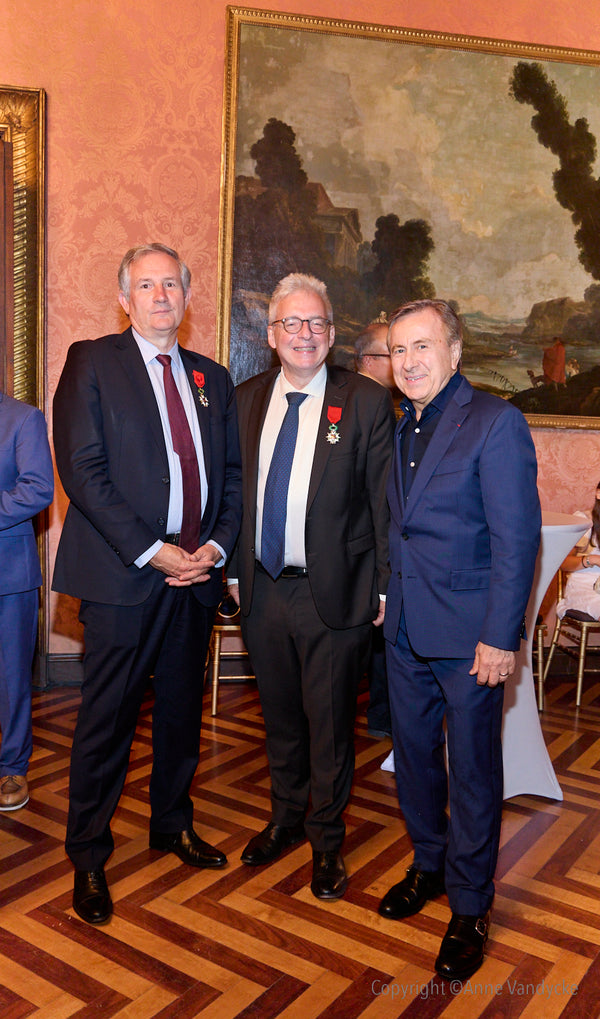 Chef Daniel Boulud with Ambassador Laurent Billi at the Legion of Honor ceremony honoring Jean-Hugues Monier at the Consulate of France in New York. Photo by NYC Event Photographer, Anne Vandycke.