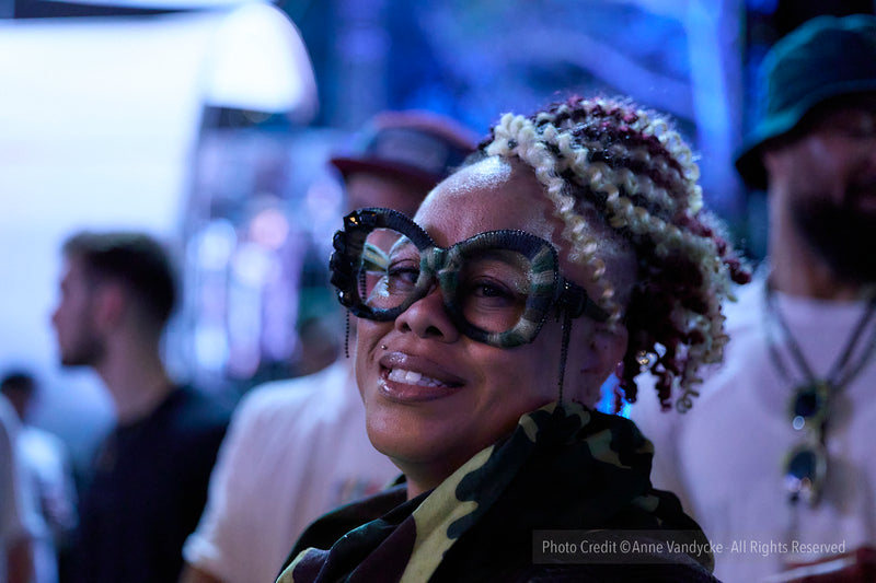 Woman in audience at Bastille Day festival in Central Park. Photo by New York photographer, Anne Vandycke.